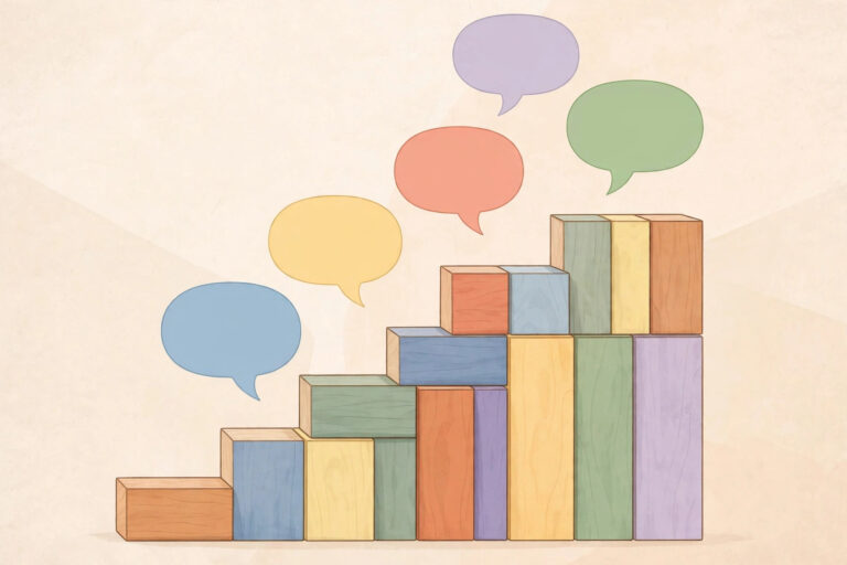 Colorful building blocks forming steps with speech bubbles — an illustration of the step-by-step teaching approach of Smart ABA therapy
